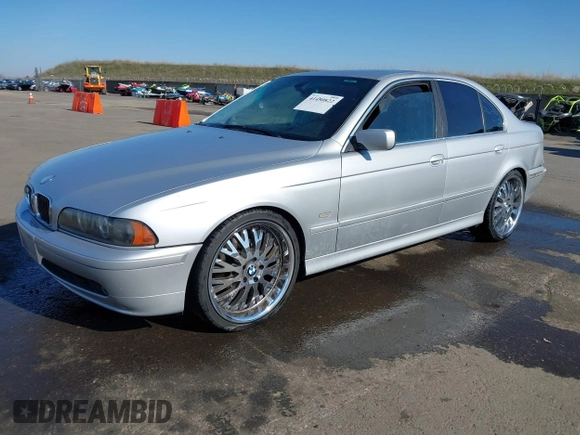 2003 BMW 5 Series 525i with VIN WBADT33473GF43821, listed as a IAAI auction lot 41450822 with 165,062 mi miles. Bid and sale history available at carsss.com. Image 2.