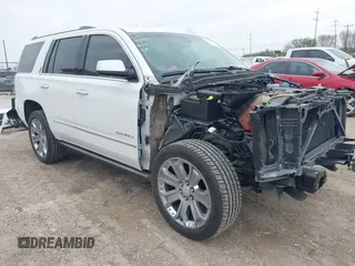 2016 GMC Yukon Denali with VIN 1GKS1CKJXGR428732, listed as a IAAI auction lot 41564721 with 64,747 mi miles. Bid and sale history available at carsss.com. Image 1.