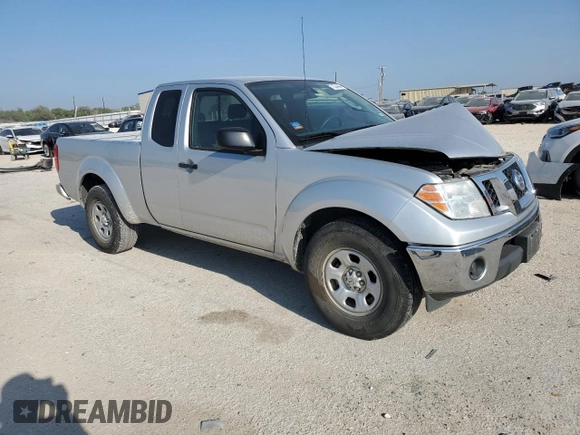 2010 Nissan Frontier XE with VIN 1N6BD0CT1AC427994, listed as a Copart auction lot 71574484 with 121,102 mi miles and Salvage title. Bid and sale history available at DreamBid. Image 4.