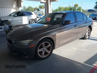 2013 BMW 3 Series 320i with VIN WBA3B1C54DK129838, listed as a IAAI auction lot 42752788 with 95,262 mi miles and . Bid and sale history available at DreamBid. Image 2.