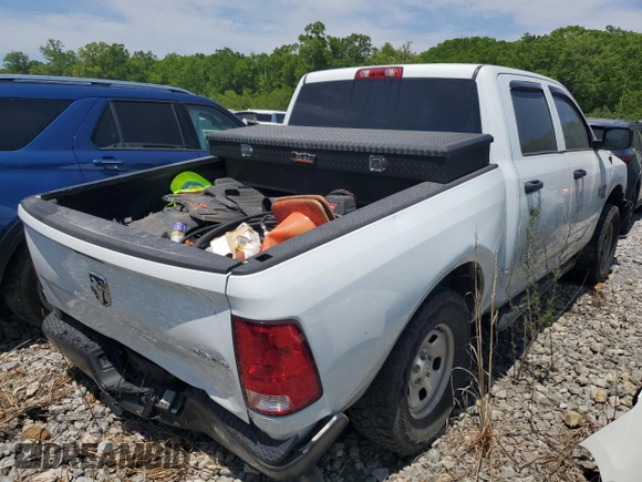 2023 Ram 1500 Tradesman with VIN 3C6RR7KG4PG649569, listed as a Copart auction lot 51796845 with 38,614 mi miles and Salvage title. Bid and sale history available at DreamBid. Image 3.