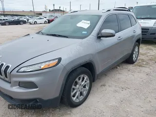 2018 Jeep Cherokee Latitude with VIN 1C4PJLCX4JD559096, listed as a IAAI auction lot 41925282 with 127,488 mi miles and . Bid and sale history available at DreamBid. Image 6.
