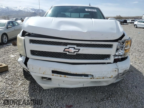 2011 Chevrolet Silverado 1500 LT with VIN 3GCPKSE36BG138213, listed as a Copart auction lot 52135275 with 305,791 mi miles and Salvage Title. Bid and sale history available at DreamBid. Image 5.