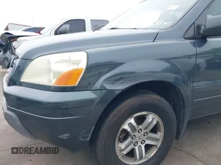 2005 Honda Pilot EX-L with VIN 5FNYF18565B046464, listed as a IAAI auction lot 41879495 with 228,021 mi miles. Bid and sale history available at carsss.com. Image 20.