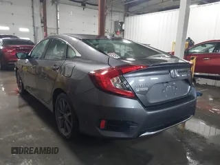 2020 Honda Civic EX-L with VIN 19XFC1F70LE010163, listed as a IAAI auction lot 41306532 with 88,767 mi miles and . Bid and sale history available at DreamBid. Image 3.