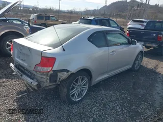2012 Scion tC z VIN JTKJF5C73C3041811, wystawiony jako IAAI lot #41649126 z przebiegiem 188 685 mil mil oraz . Historia ofert i sprzedaży dostępna na DreamBid. Obrazek 4.