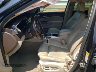 2015 Cadillac SRX Luxury Collection z VIN 3GYFNBE35FS534651, wystawiony jako Copart lot #59124955 z przebiegiem Nie podano mil oraz Szkoda całkowita • Salvage title. Historia ofert i sprzedaży dostępna na DreamBid. Obrazek 7.