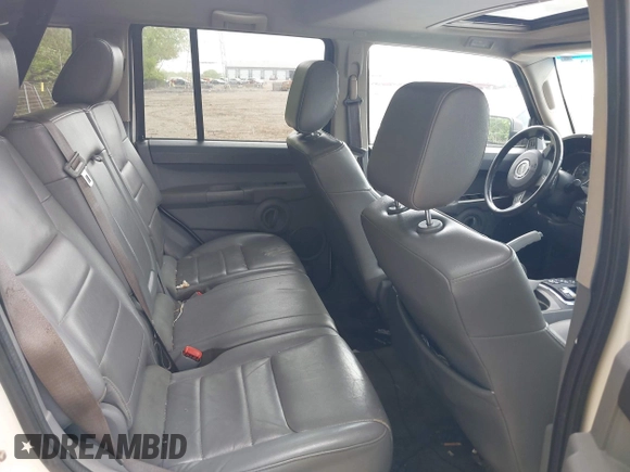 2007 Jeep Commander with VIN 1J8HG48N77C611652, listed as a IAAI auction lot 42144524 with 211,976 mi miles. Bid and sale history available at carsss.com. Image 8.