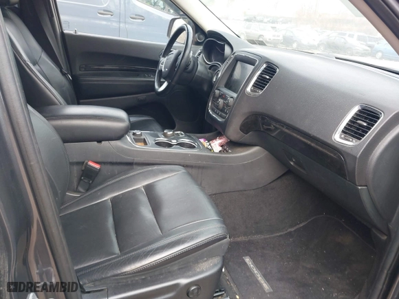 2014 Dodge Durango Limited with VIN 1C4SDJDTXEC345520, listed as a IAAI auction lot 41406601 with 148,216 mi miles. Bid and sale history available at carsss.com. Image 5.