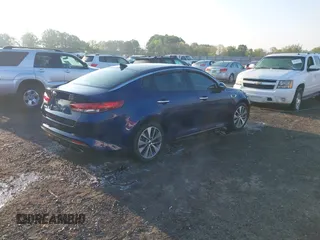 2018 Kia Optima S z VIN 5XXGT4L39JG257726, wystawiony jako IAAI lot #42009032 z przebiegiem 130 448 mil mil oraz . Historia ofert i sprzedaży dostępna na DreamBid. Obrazek 4.