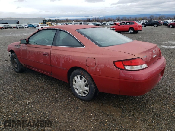 2000 Toyota Solara SE with VIN 2T1CG22P9YC375675, listed as a Copart auction lot 86199014 with 168,998 mi miles and Salvage Title. Bid and sale history available at carsss.com. Image 2.