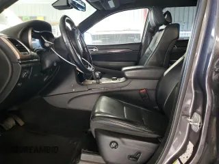 2015 Jeep Grand Cherokee Summit with VIN 1C4RJFJM9FC711776, listed as a Copart auction lot 84464454 with 94,637 mi miles and Salvage Title. Bid and sale history available at carsss.com. Image 7.
