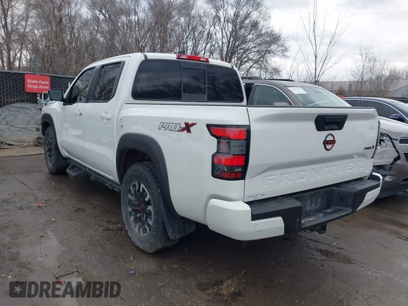 2022 Nissan Frontier SV z VIN 1N6ED1EJ2NN646035, wystawiony jako IAAI lot #41702459 z przebiegiem 93 030 mil mil oraz . Historia ofert i sprzedaży dostępna na DreamBid. Obrazek 3.