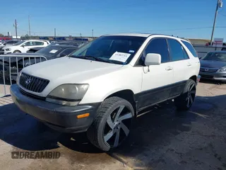 1999 Lexus RX 300 Luxury SUV with VIN JT6HF10U1X0086852, listed as a IAAI auction lot 41383711 with 284,047 mi miles. Bid and sale history available at carsss.com. Image 2.