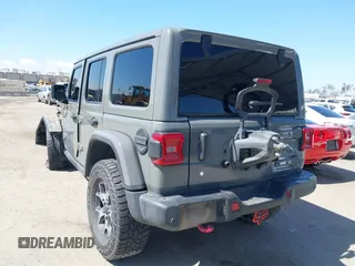 2019 Jeep Wrangler Unlimited Rubicon with VIN 1C4HJXFN6KW547401, listed as a IAAI auction lot 42250698 with 103,910 mi miles and . Bid and sale history available at DreamBid. Image 3.