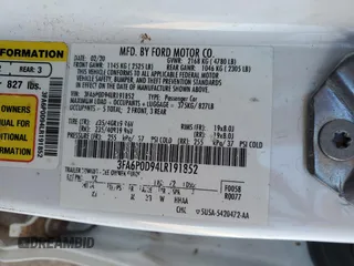 2020 Ford Fusion Titanium with VIN 3FA6P0D94LR191852, listed as a Copart auction lot 56948825 with 116,138 mi miles and Salvage title. Bid and sale history available at DreamBid. Image 12.