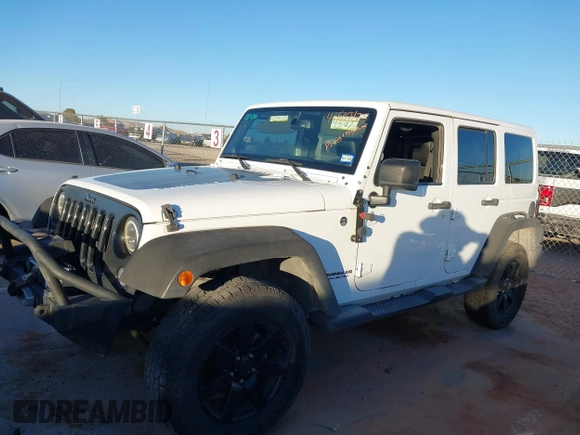 2014 Jeep Wrangler Unlimited Sahara with VIN 1C4BJWEG0EL273475, listed as a IAAI auction lot 41515425 with 128,900 mi miles. Bid and sale history available at carsss.com. Image 14.