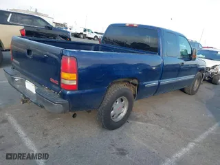 2002 GMC Sierra 1500 SLE with VIN 2GTEC19T521149253, listed as a IAAI auction lot 41470305 with 251,575 mi miles. Bid and sale history available at carsss.com. Image 4.