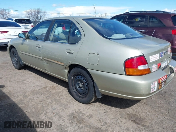 1999 Nissan Altima XE with VIN 1N4DL01D6XC179556, listed as a IAAI auction lot 41783234 with 129,064 mi miles. Bid and sale history available at carsss.com. Image 3.