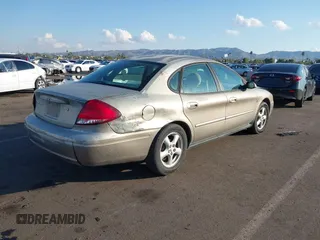 2004 Ford Taurus SES with VIN 1FAFP55S74A116833, listed as a IAAI auction lot 39086934 with Not provided miles and . Bid and sale history available at DreamBid. Image 4.