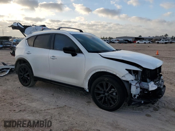 2024 Mazda CX-5 2.5 Carbon Turbo with VIN JM3KFBAY8R0443122, listed as a Copart auction lot 48023315 with 9,586 mi miles and Salvage Title. Bid and sale history available at carsss.com. Image 4.