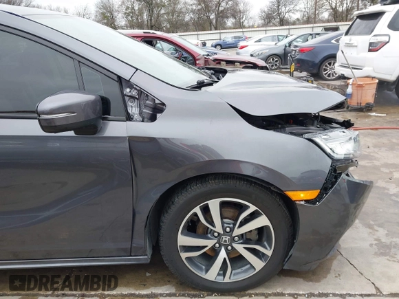 2021 Honda Odyssey Touring with VIN 5FNRL6H86MB021504, listed as a IAAI auction lot 41550040 with 55,068 mi miles. Bid and sale history available at carsss.com. Image 20.