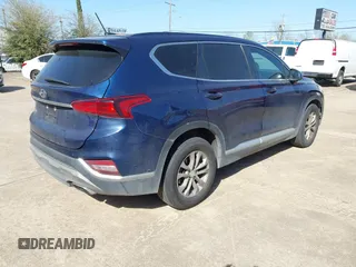 2020 Hyundai Santa Fe SE with VIN 5NMS23AD0LH141404, listed as a IAAI auction lot 41870350 with 144,109 mi miles. Bid and sale history available at carsss.com. Image 4.