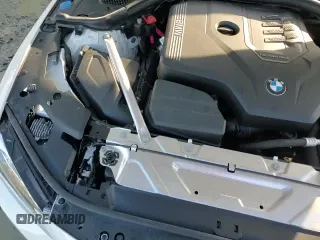 2022 BMW 4 Series 430i xDrive z VIN WBA43AT04NCH76244, wystawiony jako Copart lot #85513744 z przebiegiem 40 669 mil mil oraz Szkoda całkowita • Salvage title. Historia ofert i sprzedaży dostępna na DreamBid. Obrazek 13.