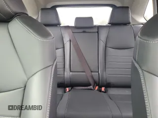 2025 Toyota RAV4 Hybrid XLE Premium z VIN JTMB6RFV6SJ065723, wystawiony jako Copart lot #49062015 z przebiegiem 2 702 mil mil oraz Szkoda całkowita • Salvage title. Historia ofert i sprzedaży dostępna na DreamBid. Obrazek 10.