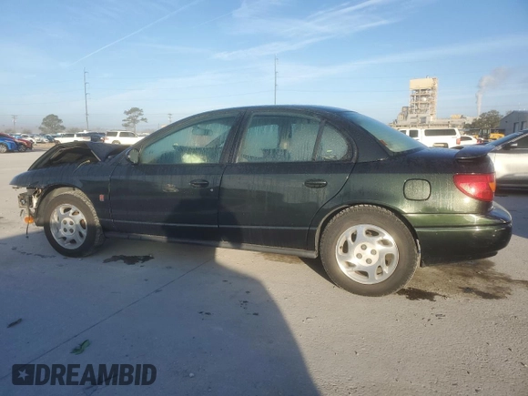 2001 Saturn SL z VIN 1G8ZK52741Z336816, wystawiony jako Copart lot #46798005 z przebiegiem 153 642 mil mil oraz Szkoda całkowita • Salvage title. Historia ofert i sprzedaży dostępna na DreamBid. Obrazek 2.