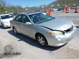 2004 Toyota Camry LE with VIN 4T1BE30K14U290983, listed as a IAAI auction lot 41983078 with 174,852 mi miles and . Bid and sale history available at carsss.com. Image 1.