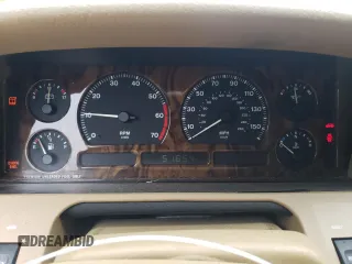 1997 Jaguar XJ with VIN SAJHX6248VC806189, listed as a Copart auction lot 57891035 with 51,654 mi miles and Salvage title. Bid and sale history available at DreamBid. Image 9.