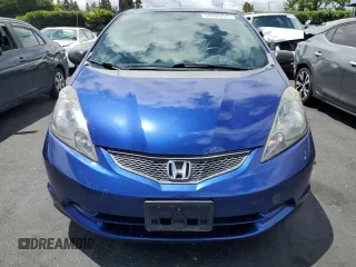 2009 Honda Fit with VIN JHMGE882X9C003678, listed as a Copart auction lot 56688265 with 141,003 mi miles and Salvage title. Bid and sale history available at DreamBid. Image 5.