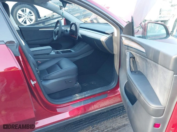 2024 Tesla Model Y Long Range with VIN 7SAYGDEEXRA264447, listed as a IAAI auction lot 41667885 with 16,167 mi miles. Bid and sale history available at carsss.com. Image 5.
