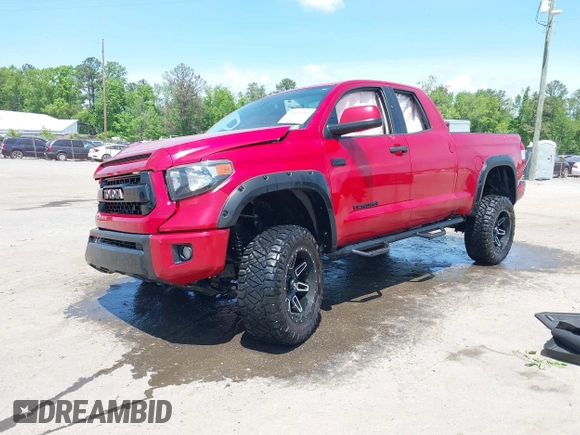 2017 Toyota Tundra SR z VIN 5TFUY5F10HX677527, wystawiony jako IAAI lot #42157357 z przebiegiem 43 111 mil mil oraz . Historia ofert i sprzedaży dostępna na DreamBid. Obrazek 2.