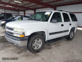 2004 Chevrolet Tahoe LT with VIN 1GNEK13T14J271832, listed as a IAAI auction lot 41109626 with 198,397 mi miles. Bid and sale history available at carsss.com. Image 2.