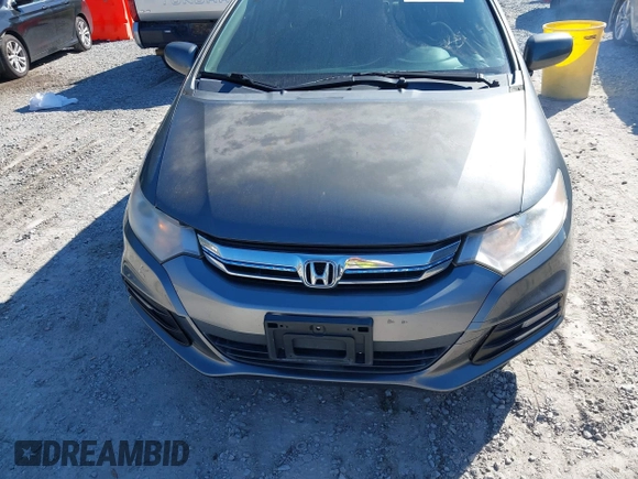 2012 Honda Insight LX with VIN JHMZE2H56CS004226, listed as a IAAI auction lot 41705401 with 131,761 mi miles and . Bid and sale history available at DreamBid. Image 6.