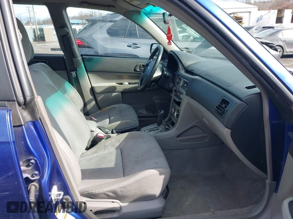 2003 Subaru Forester X with VIN JF1SG63633H748955, listed as a IAAI auction lot 41681834 with 236,196 mi miles. Bid and sale history available at carsss.com. Image 5.