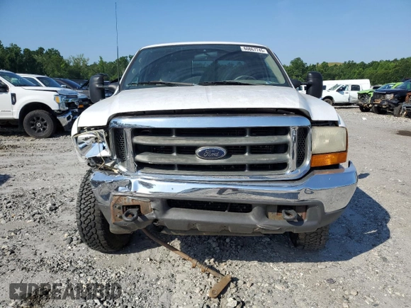 2000 Ford F-250 XL with VIN 1FTNX21F3YEB32295, listed as a Copart auction lot 60867745 with 329,194 mi miles and Salvage title. Bid and sale history available at DreamBid. Image 5.