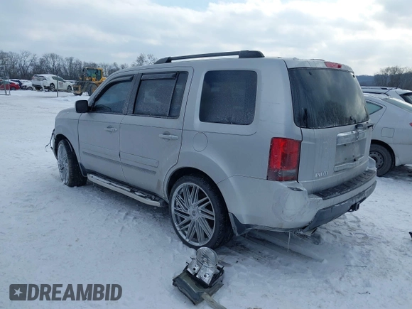 2011 Honda Pilot EX-L with VIN 5FNYF3H6XBB041672, listed as a IAAI auction lot 41337038 with 205,741 mi miles and . Bid and sale history available at DreamBid. Image 3.