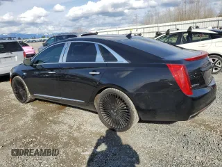 2013 Cadillac XTS Platinum z VIN 2G61V5S32D9227585, wystawiony jako Copart lot #49172025 z przebiegiem 124 646 mil mil oraz Czysty tytuł • Clean title. Historia ofert i sprzedaży dostępna na DreamBid. Obrazek 2.