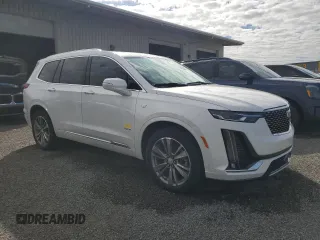 2021 Cadillac XT6 Premium Luxury z VIN 1GYKPCRSXMZ230618, wystawiony jako Copart lot #81022824 z przebiegiem Nie podano mil oraz Szkoda całkowita • Salvage title. Historia ofert i sprzedaży dostępna na DreamBid. Obrazek 4.
