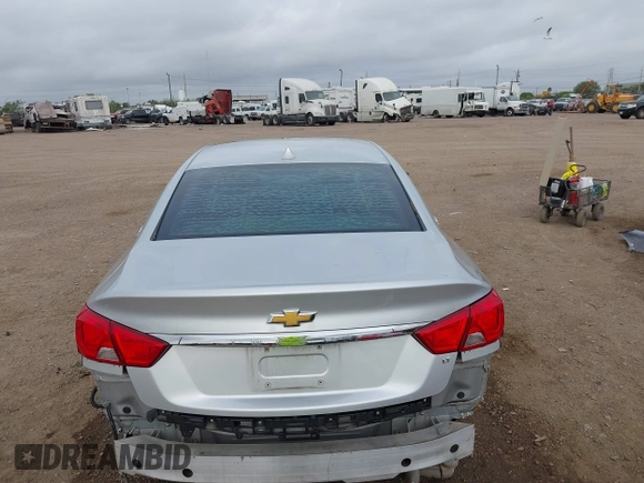 2014 Chevrolet Impala LT with VIN 2G1125S38E9102607, listed as a IAAI auction lot 41860235 with 128,599 mi miles and . Bid and sale history available at DreamBid. Image 17.