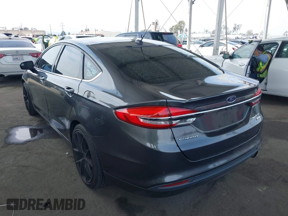 2017 Ford Fusion SE with VIN 3FA6P0HDXHR242034, listed as a IAAI auction lot 42356463 with 65,584 mi miles and . Bid and sale history available at DreamBid. Image 3.