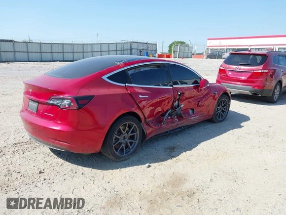 2020 Tesla Model 3 Long Range with VIN 5YJ3E1EB5LF783269, listed as a IAAI auction lot 42085024 with 80,939 mi miles. Bid and sale history available at carsss.com. Image 4.