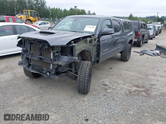 2021 Toyota Tacoma SR5 with VIN 3TMDZ5BN1MM119711, listed as a IAAI auction lot 42479038 with 64,779 mi miles and . Bid and sale history available at DreamBid. Image 18.