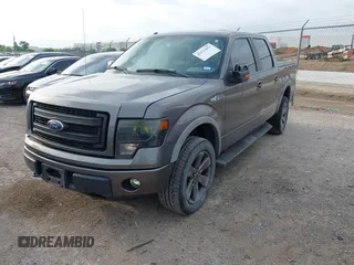 2014 Ford F-150 XL with VIN 1FTFW1EFXEKF21377, listed as a IAAI auction lot 42133053 with 99,924 mi miles and . Bid and sale history available at DreamBid. Image 2.