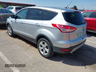 2016 Ford Escape SE with VIN 1FMCU9G98GUA10333, listed as a IAAI auction lot 42021490 with 128,973 mi miles. Bid and sale history available at carsss.com. Image 3.