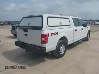 2018 Ford F-150 XL with VIN 1FTFW1E53JKC39874, listed as a IAAI auction lot 42099372 with 111,563 mi miles. Bid and sale history available at carsss.com. Image 4.