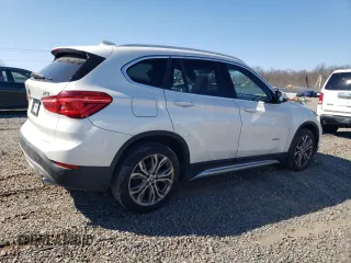 2017 BMW X1 xDrive28i with VIN WBXHT3C31H5F82700, listed as a Copart auction lot 48051095 with 76,861 mi miles and Salvage Title. Bid and sale history available at carsss.com. Image 3.